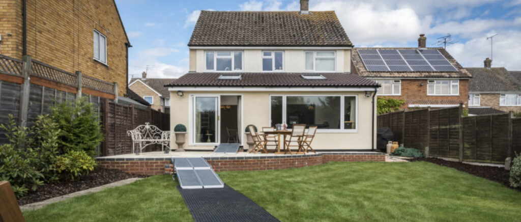 House with mobility ramp leading up to it